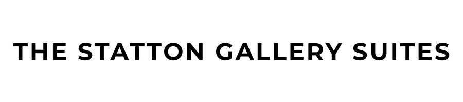 A simple black silhouette of a cat.