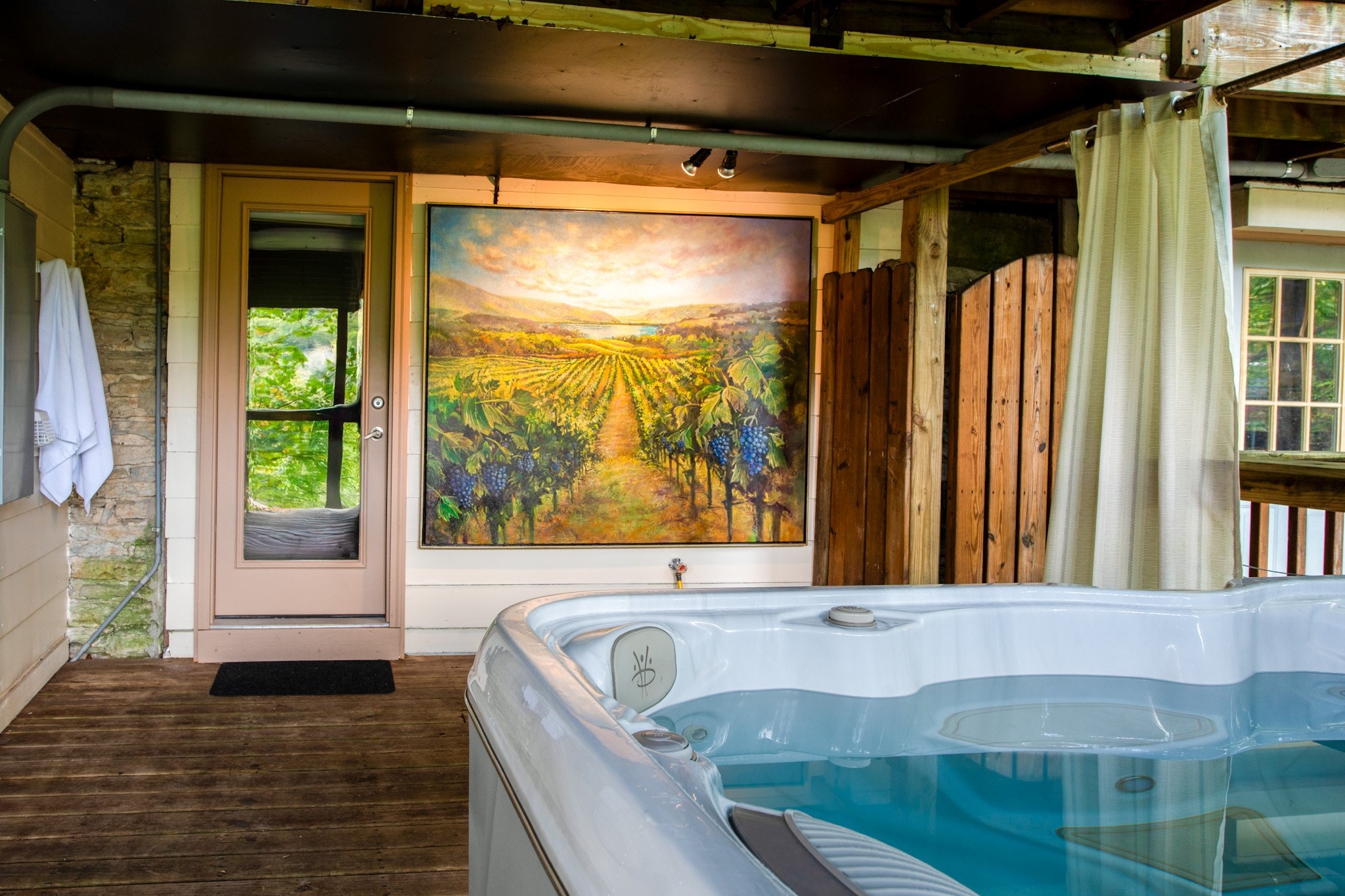 porch with hot tub